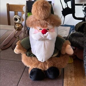 Plush Santa Toy with Green and Brown Outfit